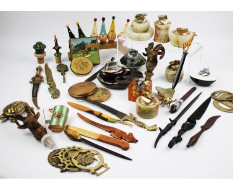 A quantity of assorted vintage items to include ladies compacts, table lighters, a selection of bottle stoppers, letter knive
