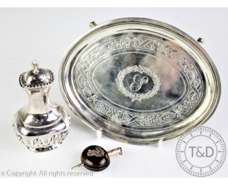 A George III oval teapot stand Alexander Field, London 1806, with chased floral banding and four bracket feet, central 'S' mo