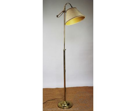 A brass standard lamp, with circular base, with two wall mirrors, a dressing table mirror, a copper warming pan and a print (