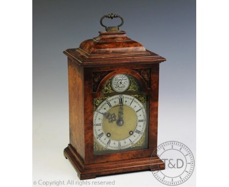 A 20th century walnut bracket clock, silvered Roman numeral chapter ring and brass dial with matted centre, with 'Empire' mov