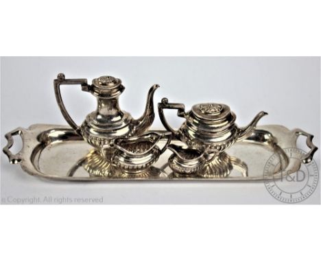 A miniature silver tea and coffee service, A Marston & Co Birmingham 1974, each piece of oval stop-fluted form, comprising;  