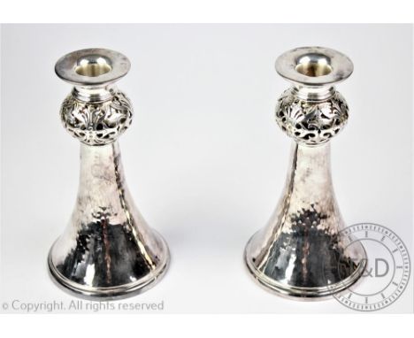 A pair of Scottish silver candlesticks, T K Ebbutt Ltd, Edinburgh 2001, each of trumpet shape, planished detailing to the col