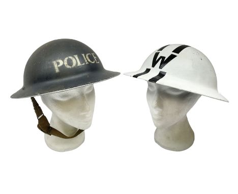 WW2 Home Front 'Police' black painted steel helmet with original liner and webbing chin strap, impressed R.O. Co. 1/1939; and