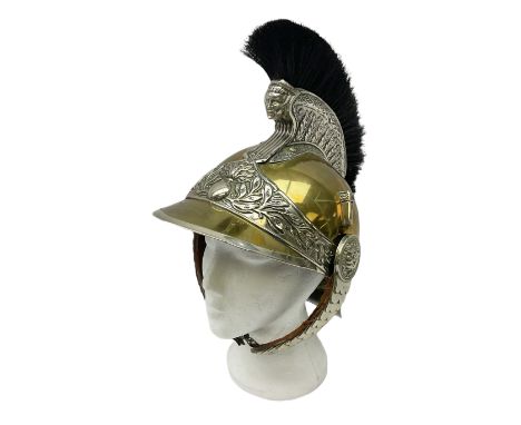 Early 20th century French mounted gendarme's helmet, brass with nickel-silver mountings, broad band embossed with fused grena