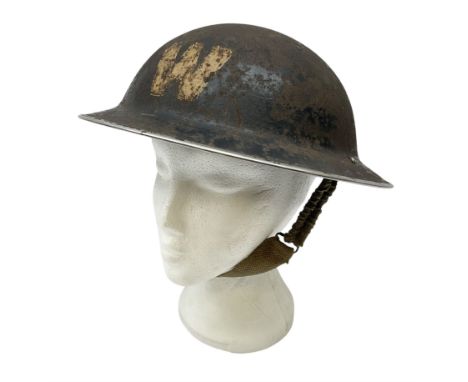 WW2 British Home Front Wardens steel helmet marked with 'W', with original liner and strapCondition Report:Only traces of ori