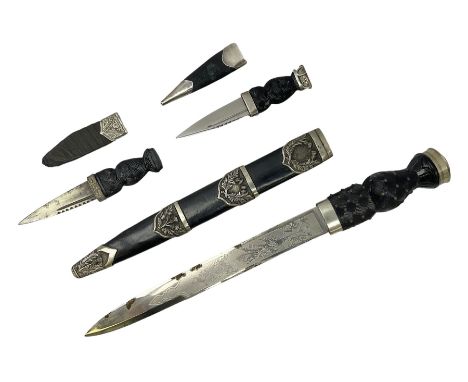 Modern Scottish dress dirk with 30cm decorative steel blade, studded black basket weave grip with Queen's crown pommel; in le