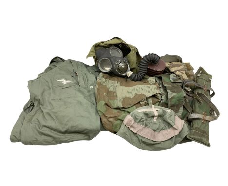 WW2 No.4 Mk.III respirator in canvas carry bag dated 1942; army camouflage poncho with adaptable tent legs; modern German Luf