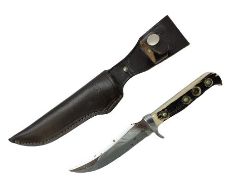 German Puma Skinner knife, the 13cm steel blade marked model 6393, serial No.55472 to guard, fixed blade, antler scales; in o