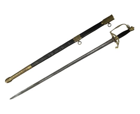 Five-ball spadroon sword with 78.5cm fullered steel blade and brass hilt with fluted swollen grip; in brass mounted leather s