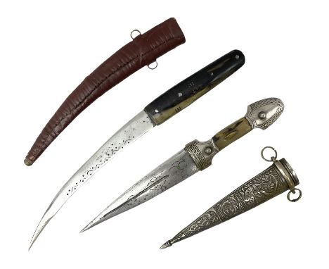 Caucasian qama or kindjal dagger, the 15cm pointed double edged blade with centre fuller and two-piece horn grip;  in nickel 