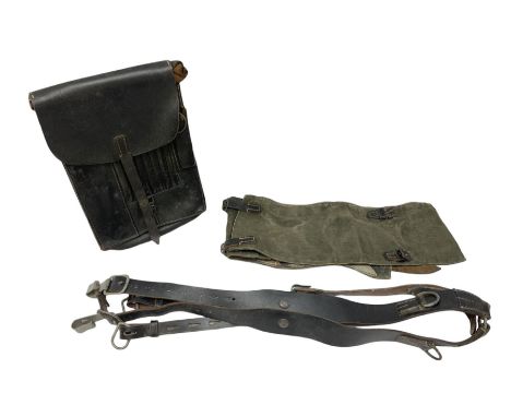 WW2 German - leather combat 'Y'-straps with numbered adjustment holes; M35 leather map case stamped Otto Breitschuh; and pair