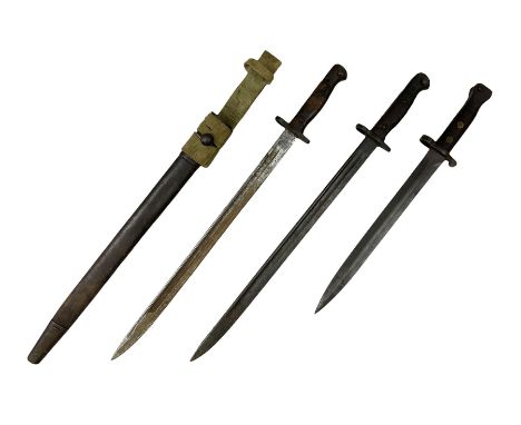 British Pattern 1907 bayonet with 43.5cm fullered steel blade; in leather scabbard with webbing frog L58cm overall; another P