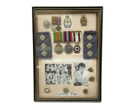 Framed display of medals and badges relating to Captain Cynthia Page of Queen Alexandra's Royal Army Nursing Corps including 