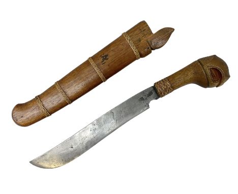 Malayan Parang the 29cm steel blade with two character marks and wicker bound hardwood hilt carved with a stylised parrot hea