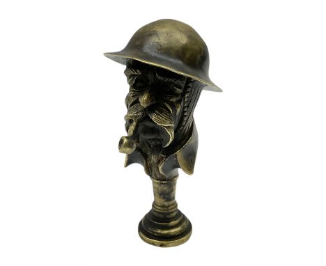 Bruce Bairnsfather 'Old Bill' style brass pipe tamper, the brim of the helmet inscribed 'YPRES' and the base 'WW1' H6.5cmCond