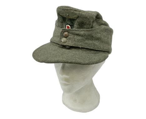 WW2 German army M43 field capCondition Report:Well worn but basically sound with some rust staining and small holes to lining