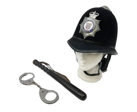 British Transport Police Custodian helmet with Queen's Crown plate; Hiatt & Co ebonised hardwood patrol truncheon; and pair o