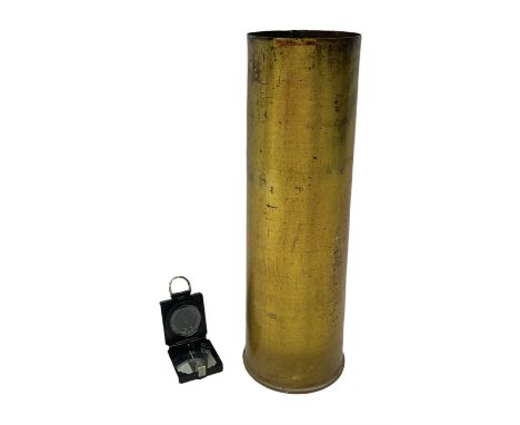 WW2 T.G. Co. Ltd. bakelite cased Mk. I magnetic marching compass No.B202247 L8cm; and large brass shell case H44.5cm D14.5cm 