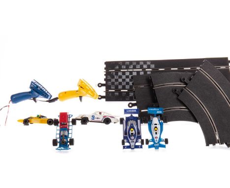 COLLECTION OF SCALEXTRIC,including nine cars, controllers and track