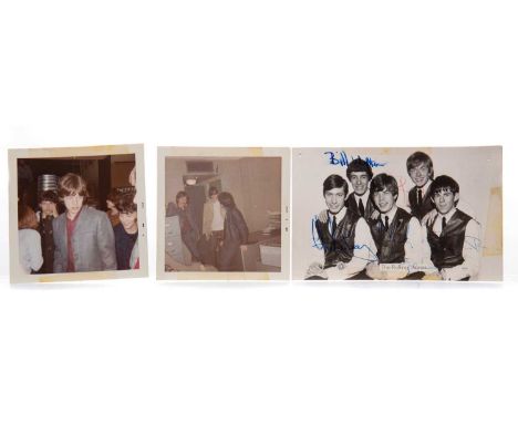 THE ROLLING STONES SIGNED PHOTOGRAPH,circa 1964, depicting and bearing signatures of Charlie Watt, Bill Wyman, Mick Jagger, B
