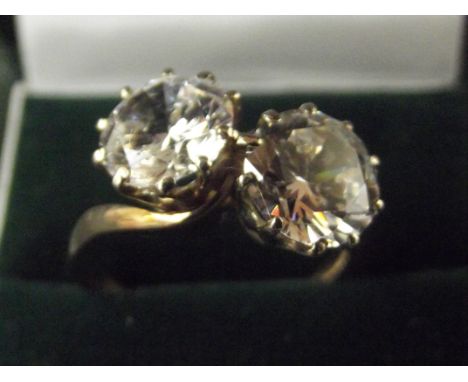 9 carat gold dress ring set with two large white stones, possibly CZ, size Q