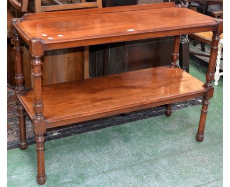 A Victorian mahogany two tier buffet, galleried back, moulded tiers, turned and blocked supports.