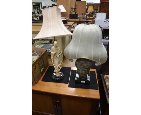 A table lamp mounted with bronzed metal Buddha head; another modelled as Chinese elder (2)