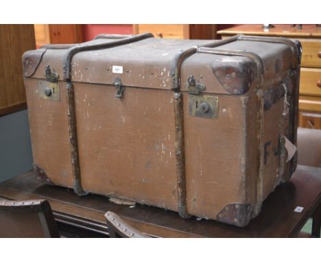 A vintage wood bound travel trunk, bears LMS Prestatyn