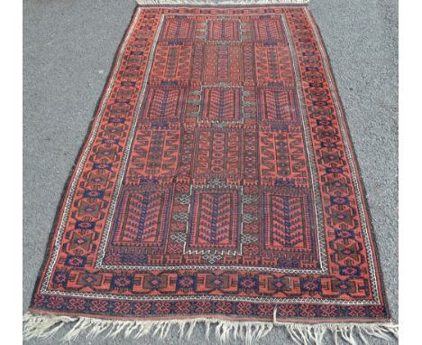 A Persian style carpet, in red and blue