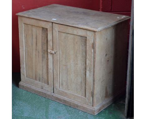 A vintage pine cupboard 