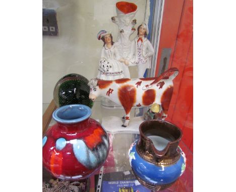 A Poole pottery vase, and dumpy weight, together with  a Staffordshire figure etc