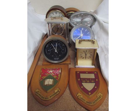 A Comitti mahogany mantle clock together with a Bentima 8-day clock, A Rhythm alarm clock, a Rhythm anniversary clock, Short 