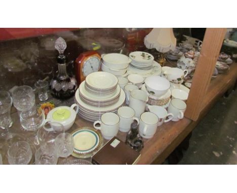 A Japanese part tea set together with a Poole pottery part dinner set, other part  sets, a Rapport mantle clock, a table lamp