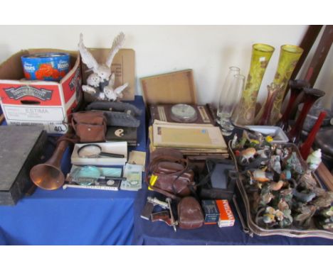 A large lot including assorted porcelain birds together with glass vases, barometer, cameras, bank notes, etc