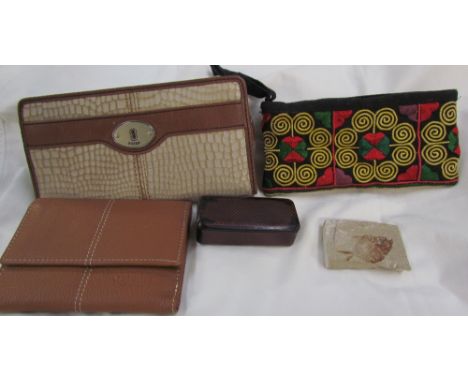 A Fossil clutch bag together with an Osprey purse, another purse, a snuff box and a fossilised fish