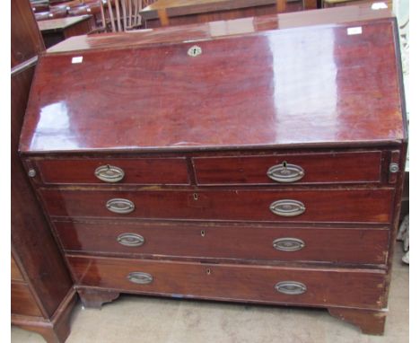 A George III mahogany bureau, the sloping fall enclosing a fitted interior above four drawers on bracket feet