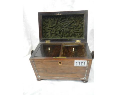 A Victorian rosewood tea caddy in very good condition.