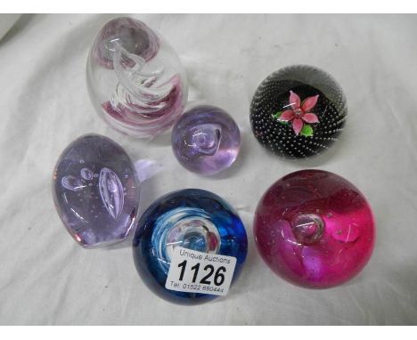 Six good glass paperweights including Caithness,.