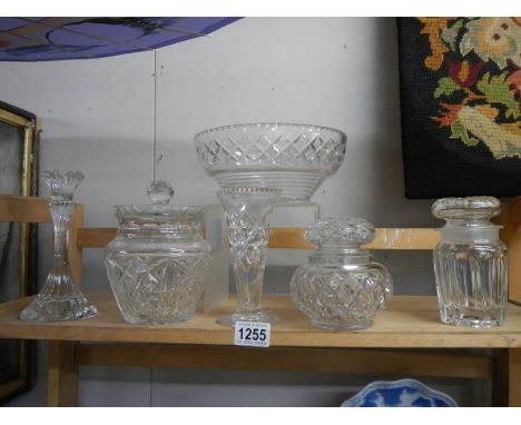 A mixed lot of cut and other glass.Candle stick chip to rim.Vase chip to rim.Bowl chip to rim.Tall narrow lidded pot crack to