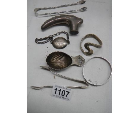 A mixed lot including silver bangle and various plated items.