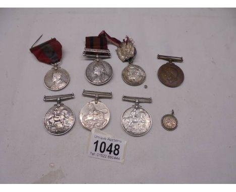 A collection of medals including Victoria Defence of Ladysmith medal for Pte G Bennett, Faithful Service medal for Bennett an