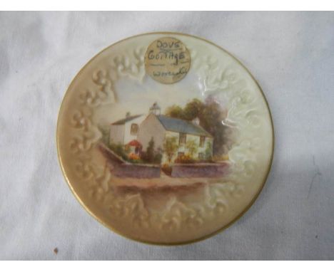 An early Royal Worcester hand painted plate depicting Dove Cottage Grasmere.
