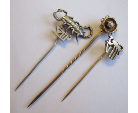 A Diamond Stick Pin claw-set old-cut stone, stamped 15ct, a 9ct gold Stick Pin and a white metal Stick Pin