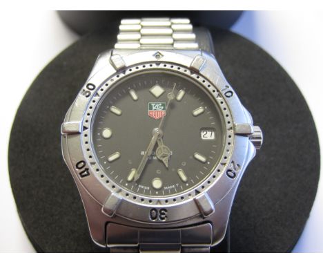 A Tag Heuer Gentleman's Automatic Wristwatch, ref: WE2110, serial G93159, the black dial with luminous hourly markers, sweep 
