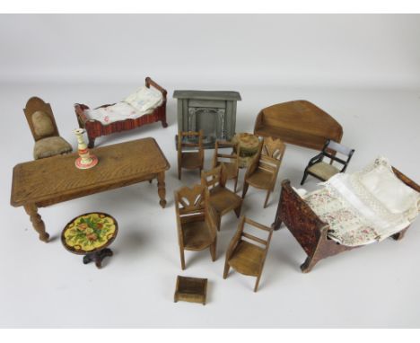 Dolls House items: A wood grained doll's Sleigh Bed with bedding 6 1/2in L, another, oak dining table, German lithographed ro