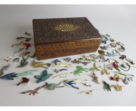 Enamel bird Brooches, swallows, eagle head, early plastic birds and a quantity of insect and zoo animal brooches contained in