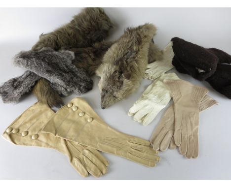 Two silver fox Stoles with masks, pair fur gauntlet gloves, cream leather gauntlet, pair cream opera length gloves, beige pai