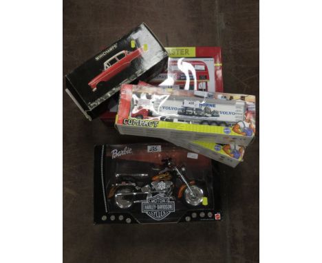 A boxed Sunstar Routemaster Bus, two boxed Jaol Compact articulated lorries, a boxed Minichamps Opel and a boxed Mattel Harle