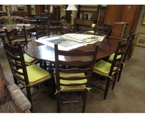 A large oak dropleaf oval Dining Table with bobbin turned supports and squared stretchers, 6ft 6in and a set of light oak lad