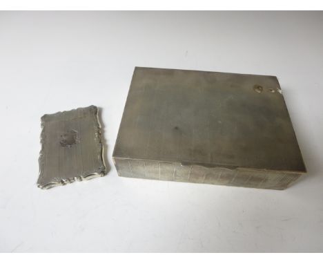 A Victorian silver Card Case with engine turning and vacant cartouche, Birmingham 1856 and an engine turned Cigarette Box, Lo